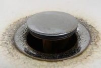 How to remove bathroom sink cap