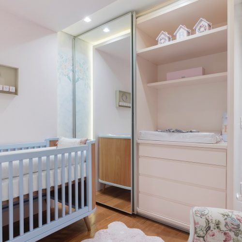 Doors with mirror are perfect for a small feminine baby room