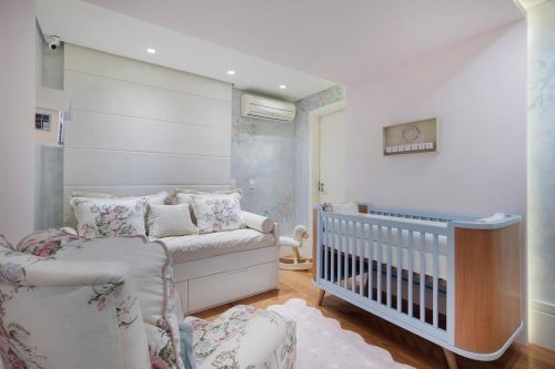 The blue and white female baby room is modern and stylish