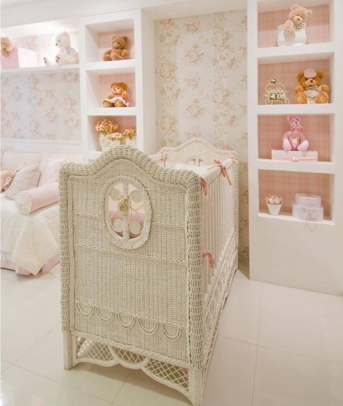 feminine baby room with beautiful and delicate wallpaper