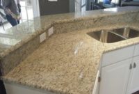 giallo ornamental granite for warm elegant kitchen design